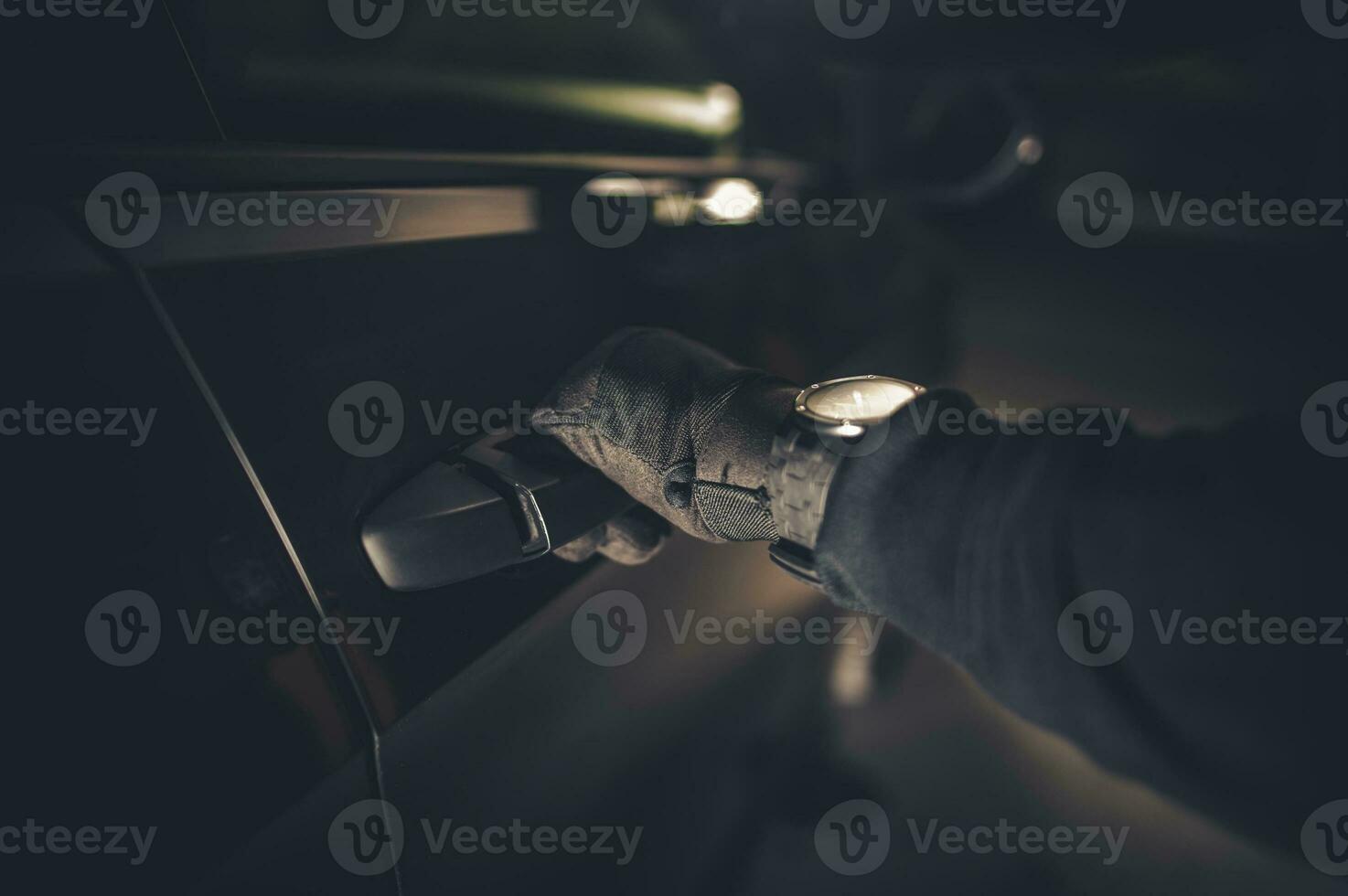 Thief Hand on a Door Handle photo