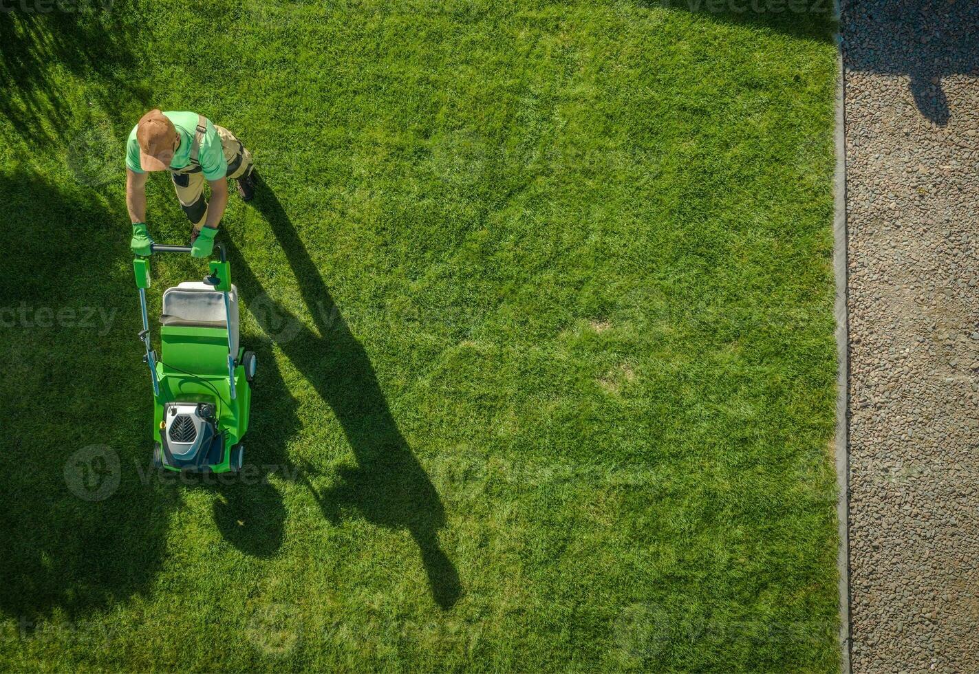Gardener Moving Lawn photo