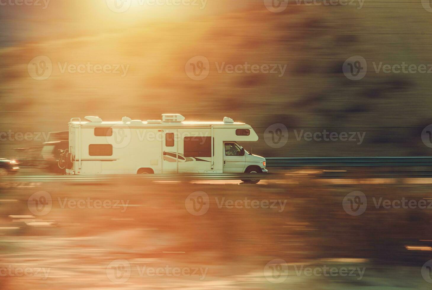 Speeding Class C Motorhome RV on a Highway 24626115 Stock Photo at Vecteezy