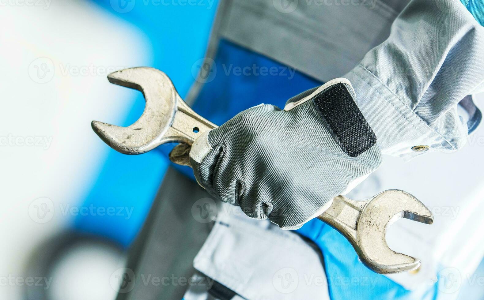 Mechanic with Large Wrench photo