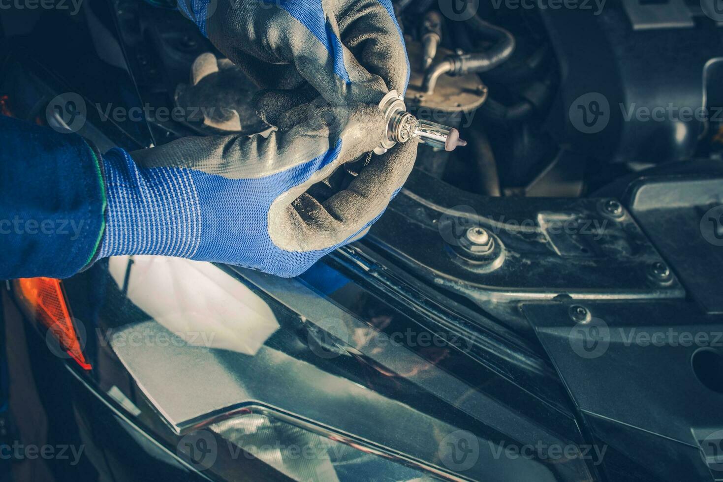 Replacing Car Headlamp Bulb photo