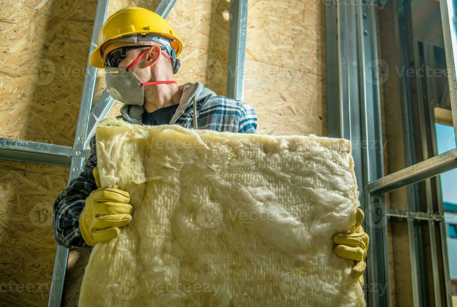 Worker with Wool Insulation photo