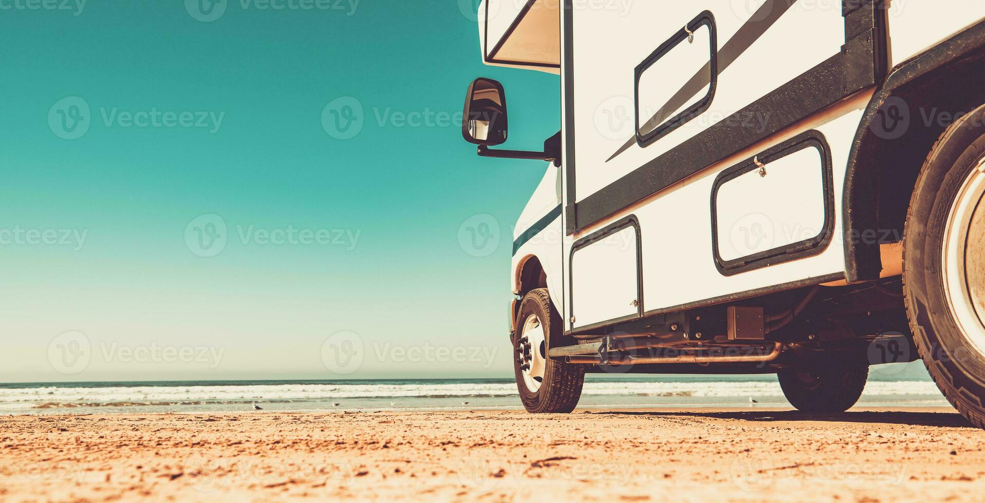 Motorhome RV on a Sandy Pismo Beach in California photo