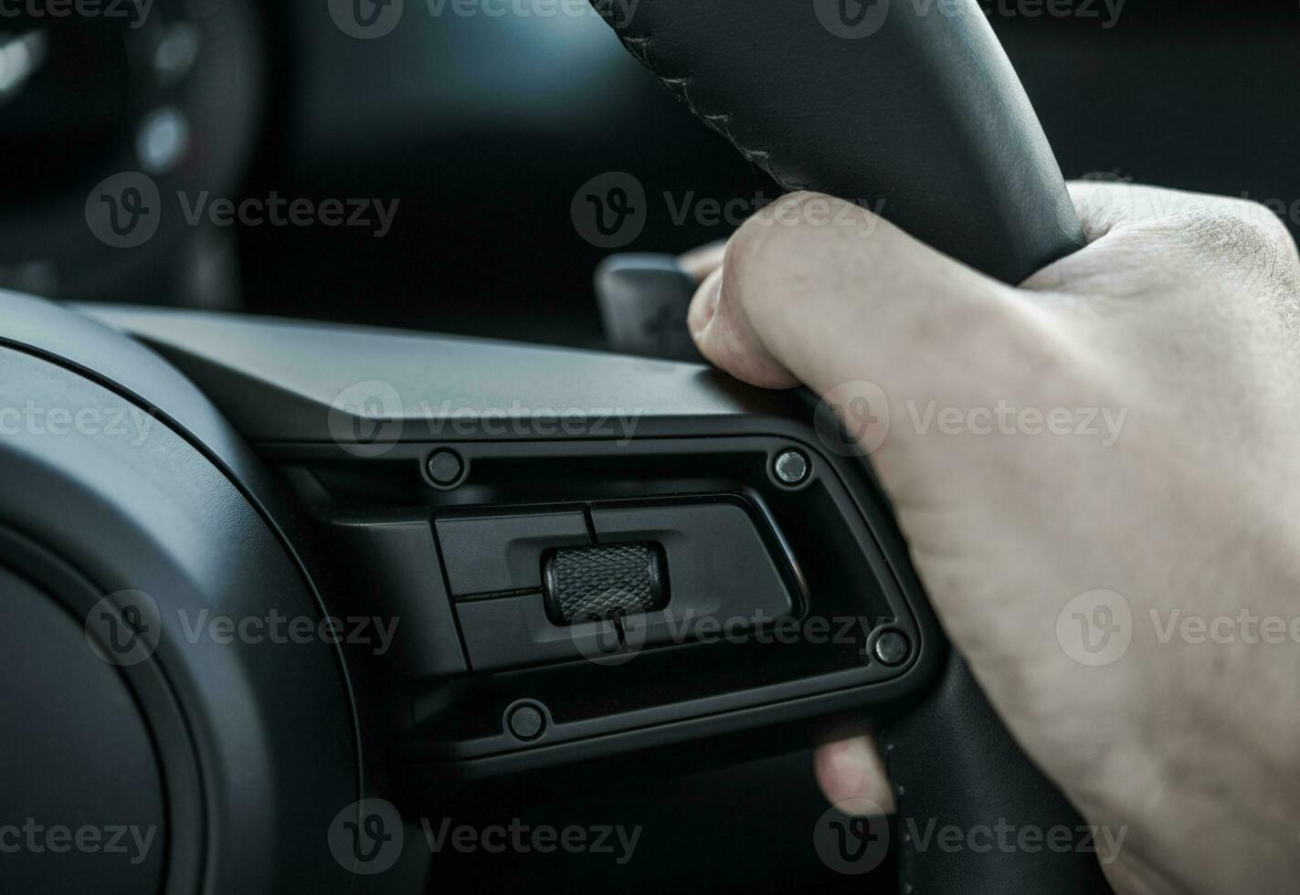 Paddle Shifter Gear Changing by Caucasian Driver Close Up photo