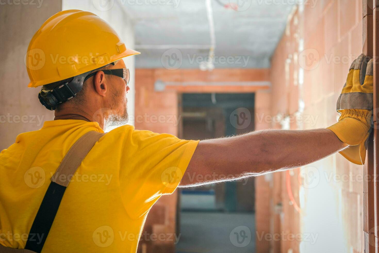 Contractor Inside Commercial Concrete Blocks Building photo