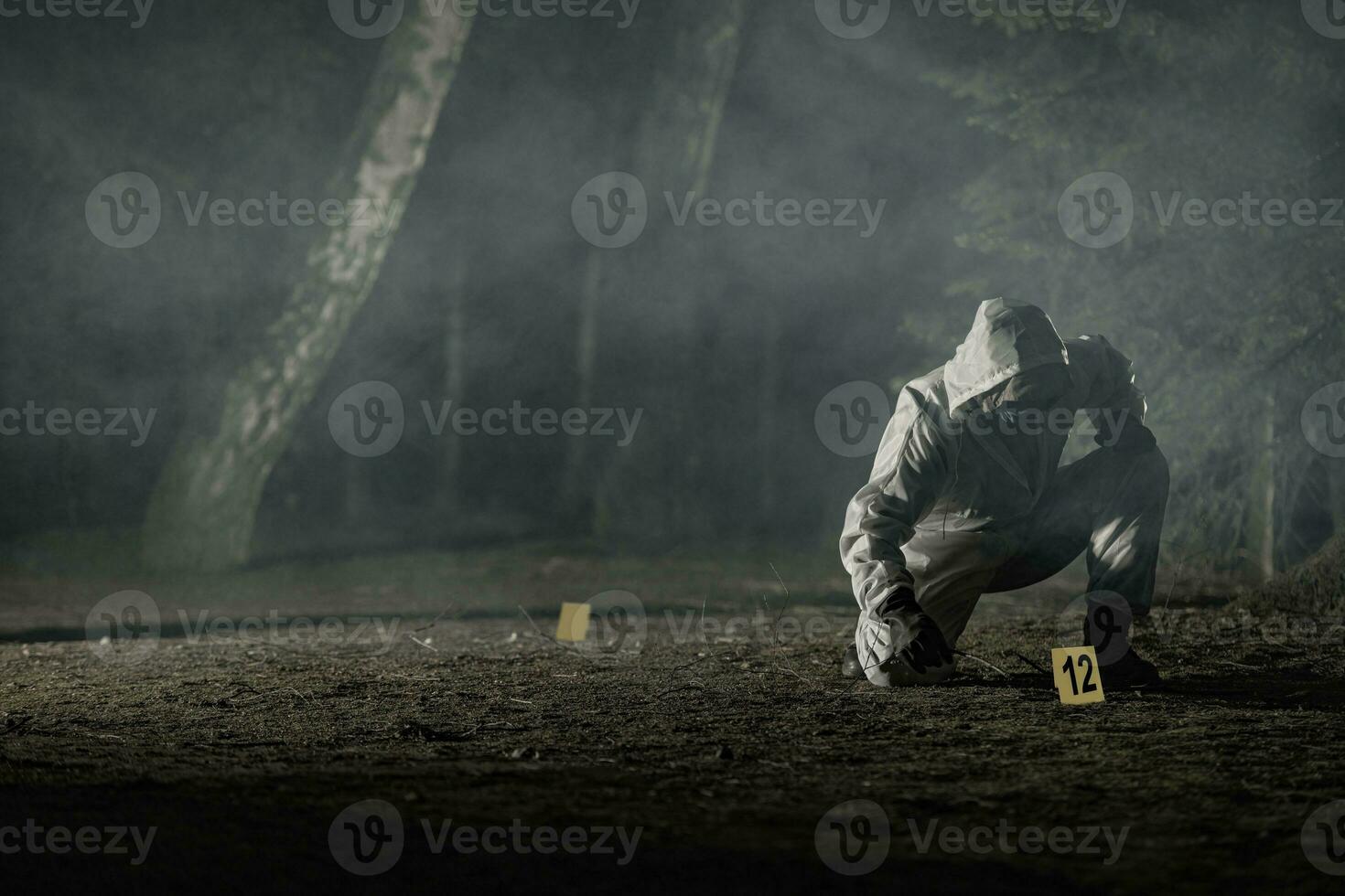 Crime Evidence Markers Placing by Forensic Officer photo