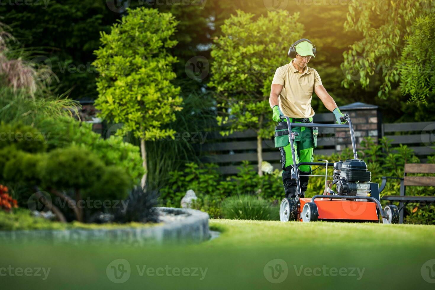 Gardener Mowing the Lawn photo