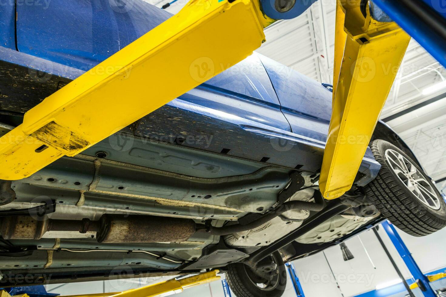 Car on a Lift at the Workshop photo