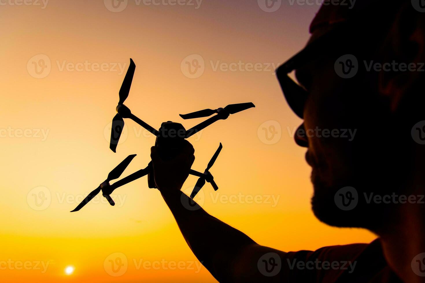 Men Flying Small Drone photo