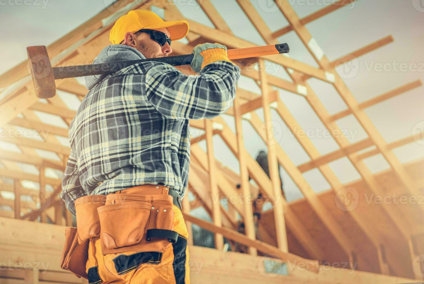 Construction Worker with Large Hammer photo