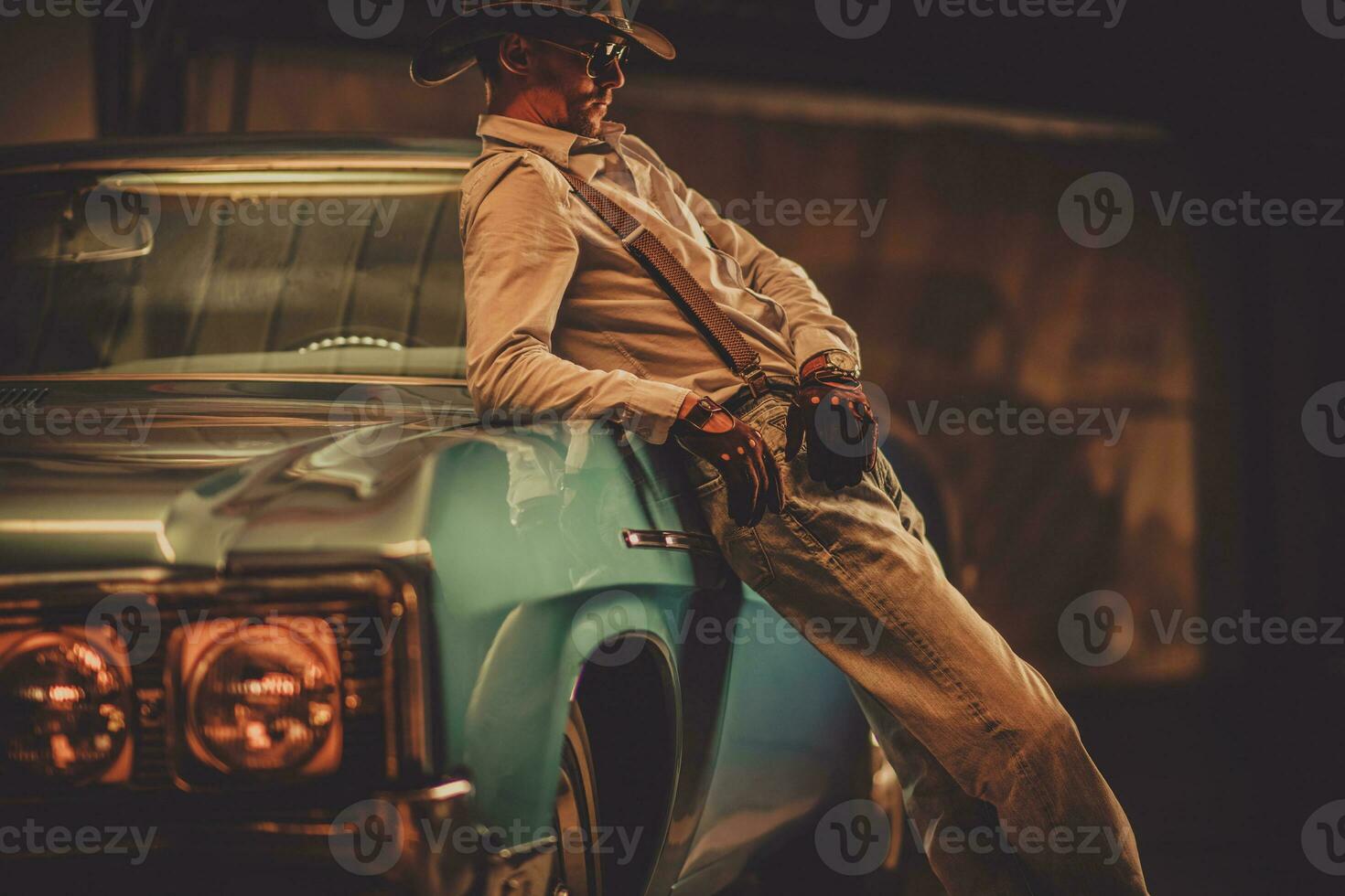 Cowboy and His Classic Vintage Car photo