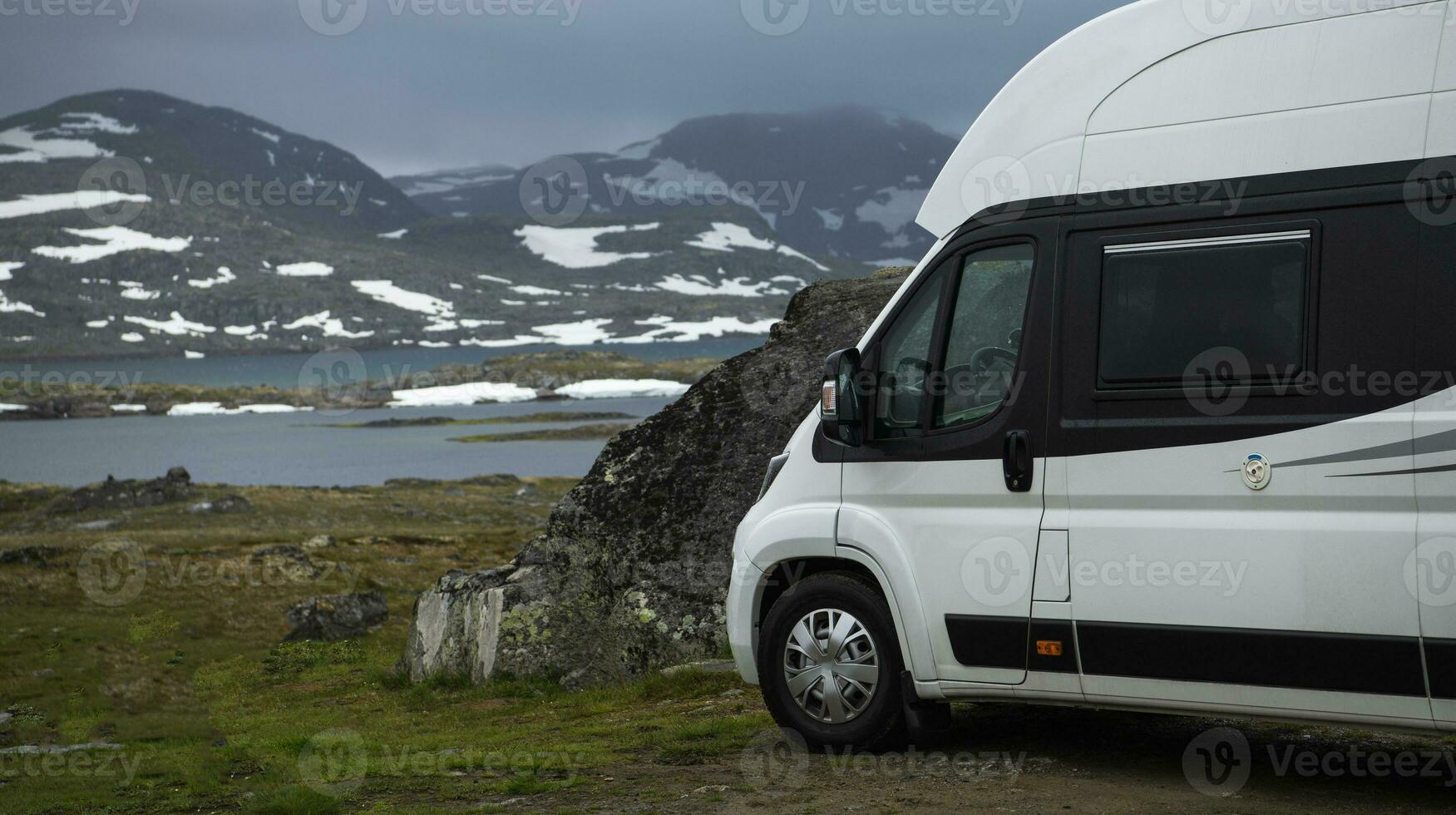 Norway Camper Van Wild Camping Next to Glacial Mountain Lakes photo