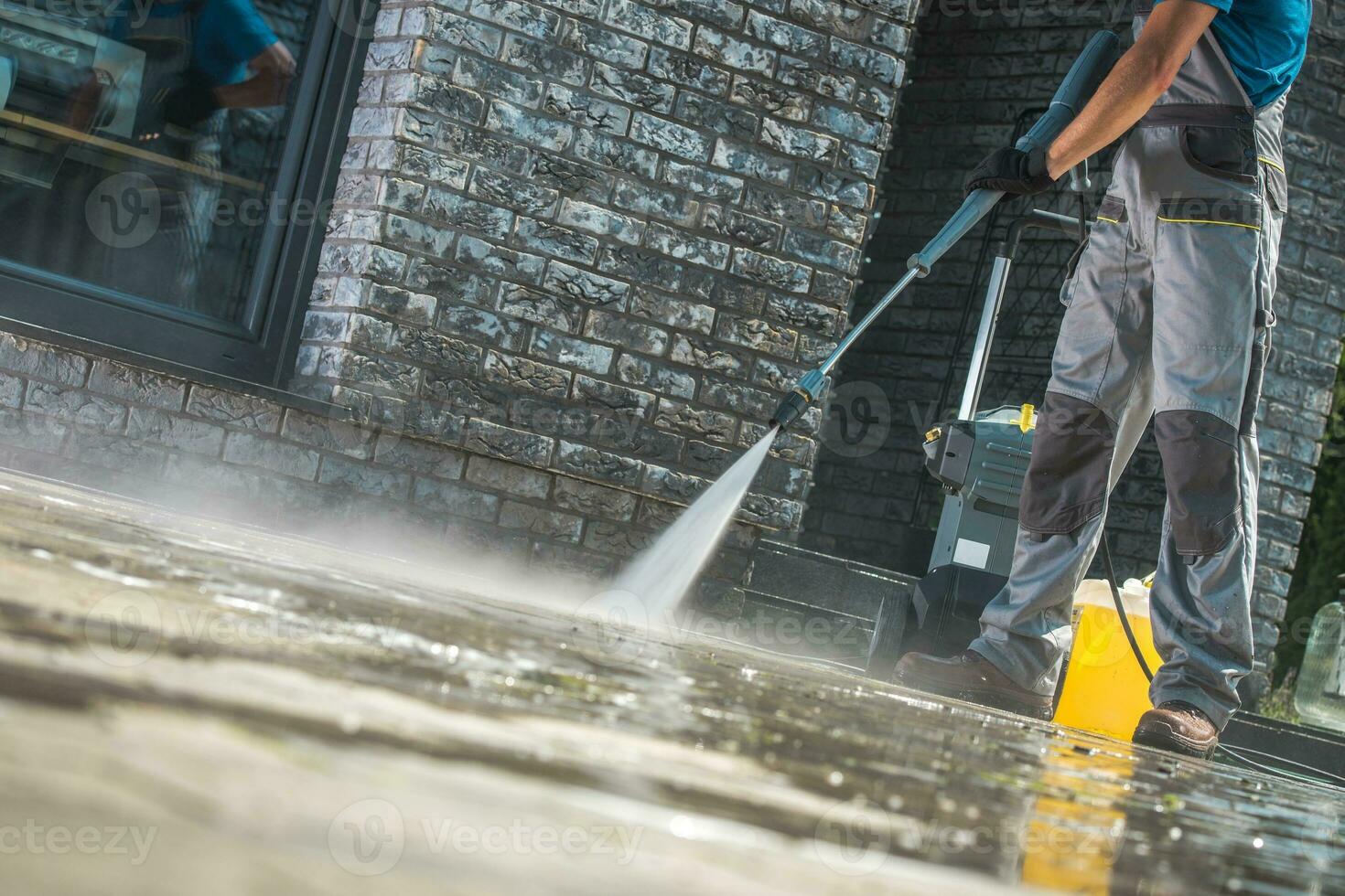 Men Washing Driveway photo