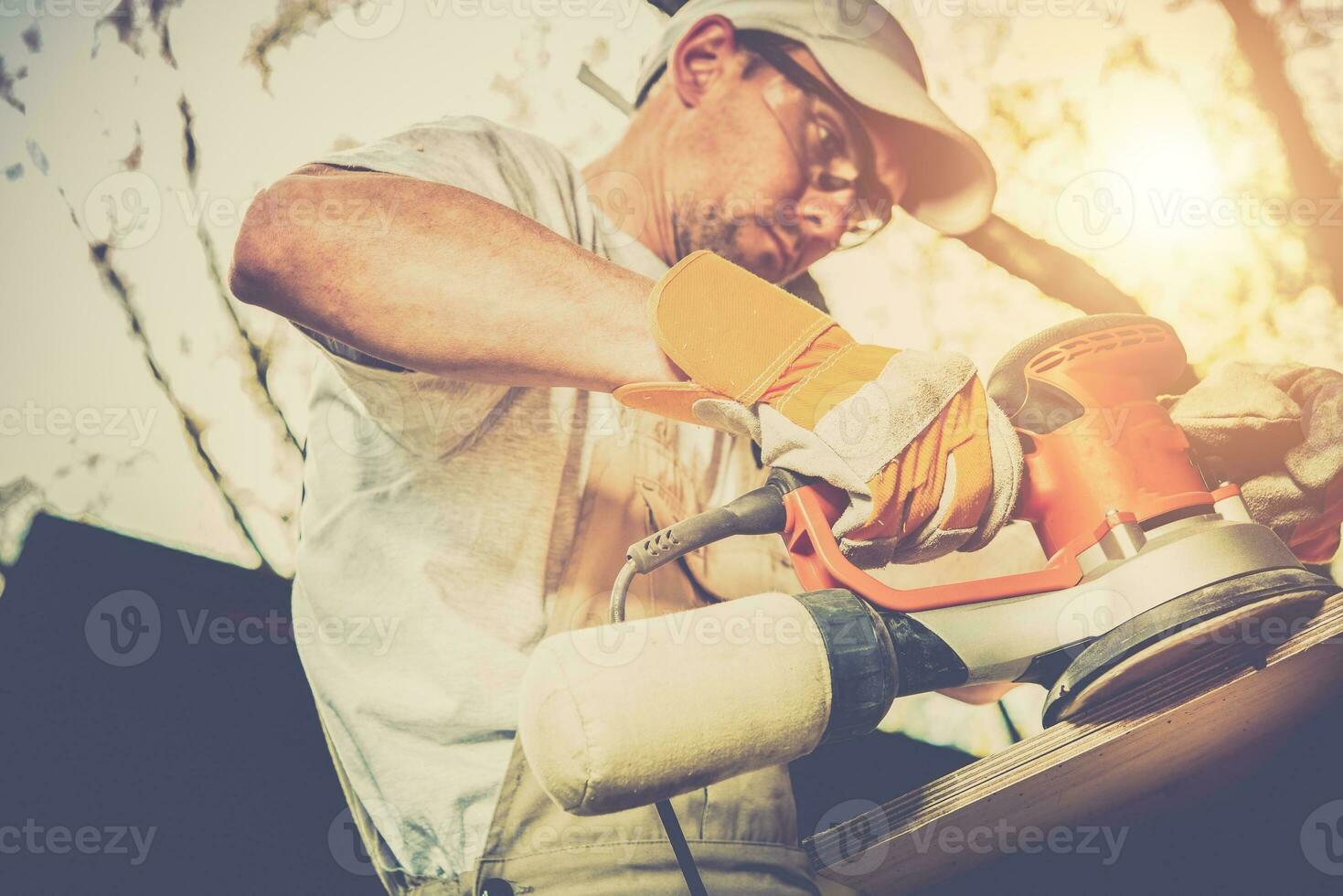 Worker Wood Sanding photo