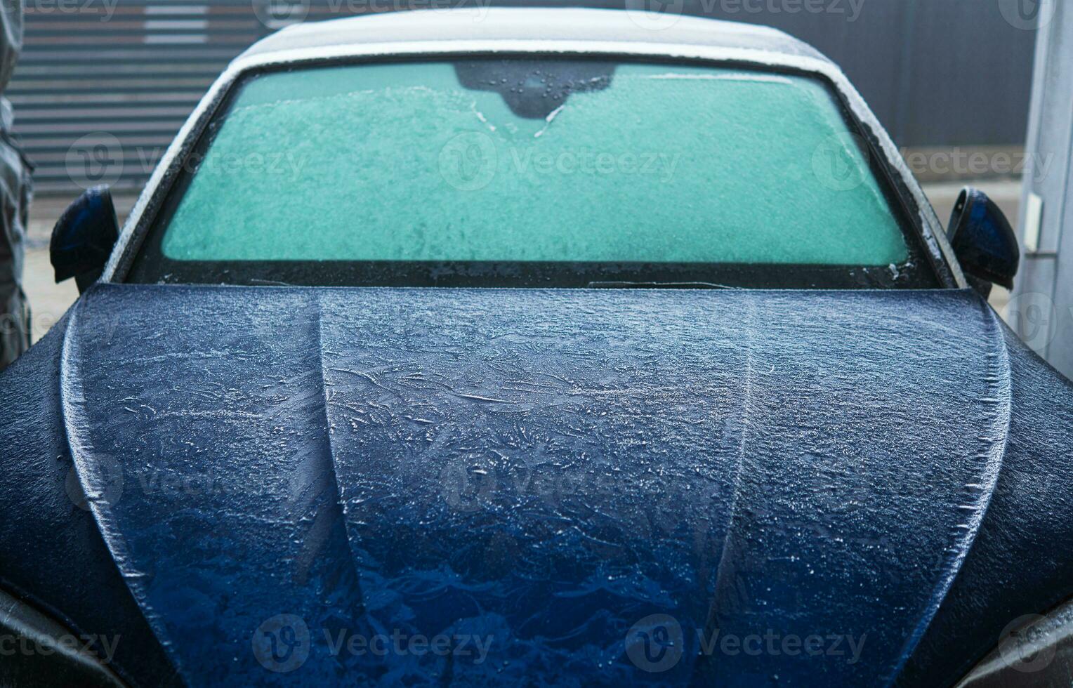 Car Covered in Frost During Cold Winter Morning photo