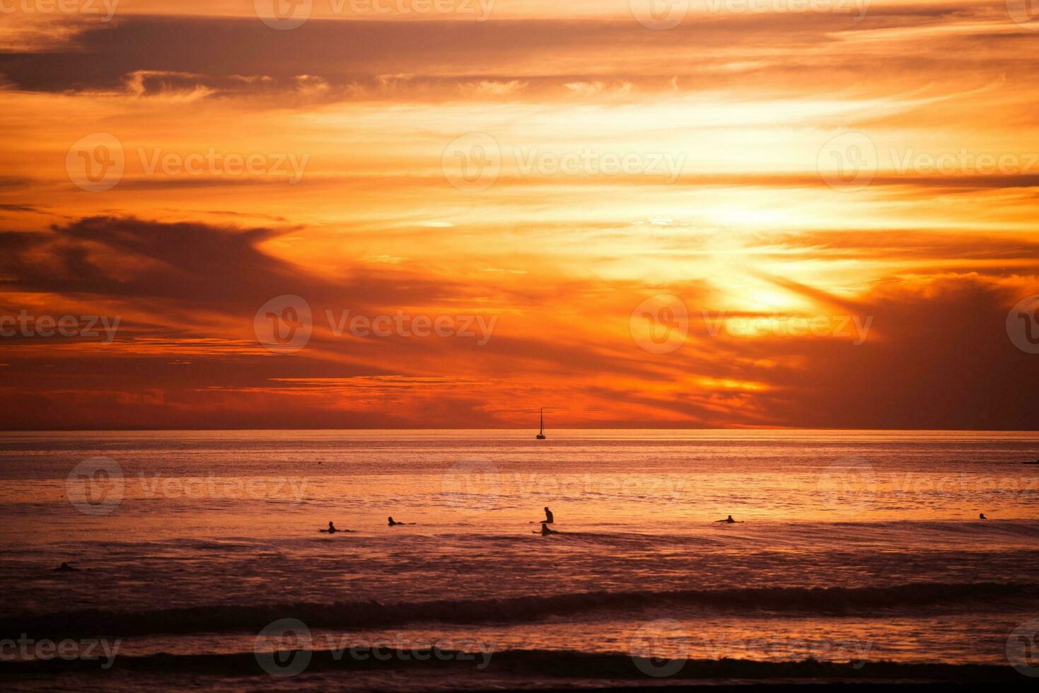 Surfers and the Ocean photo