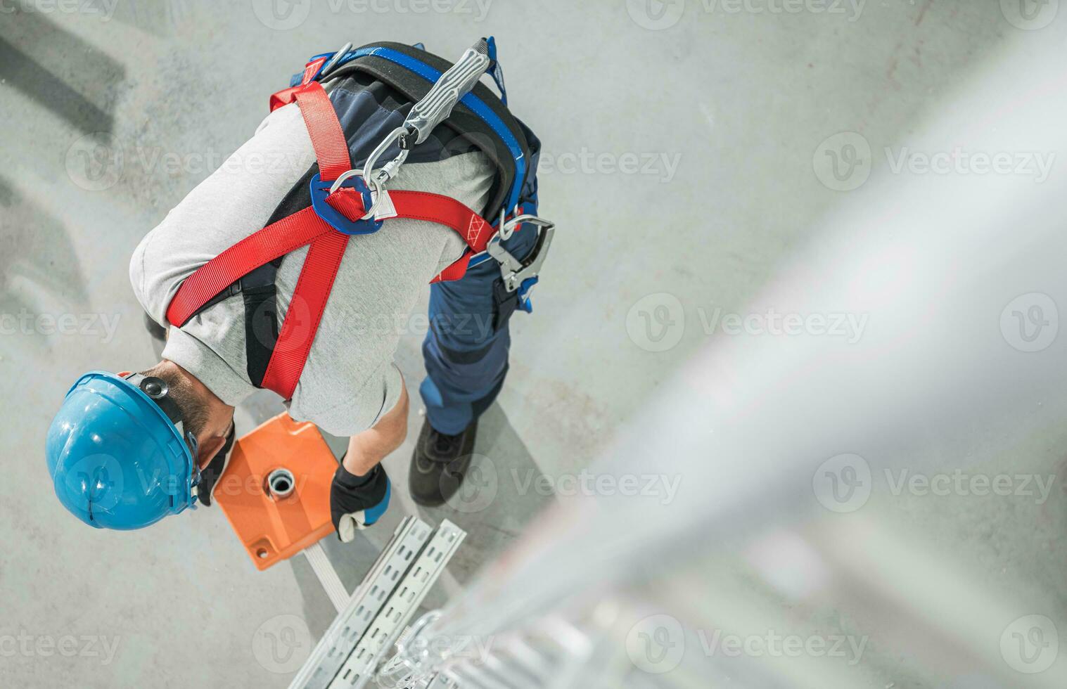 Scaffolding Counterweight Installing by a Worker photo