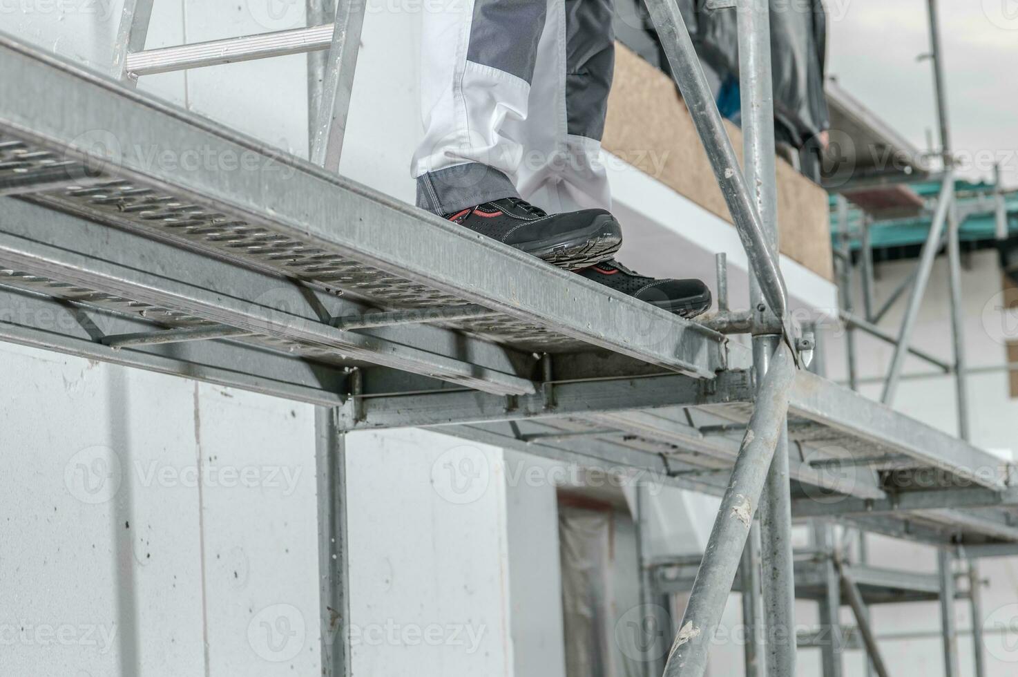 Worker on a Scaffolding photo