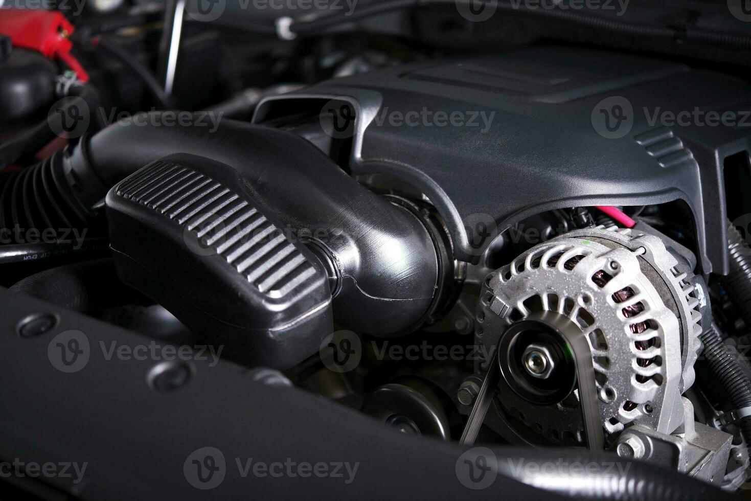 Modern Car Alternator and Engine photo