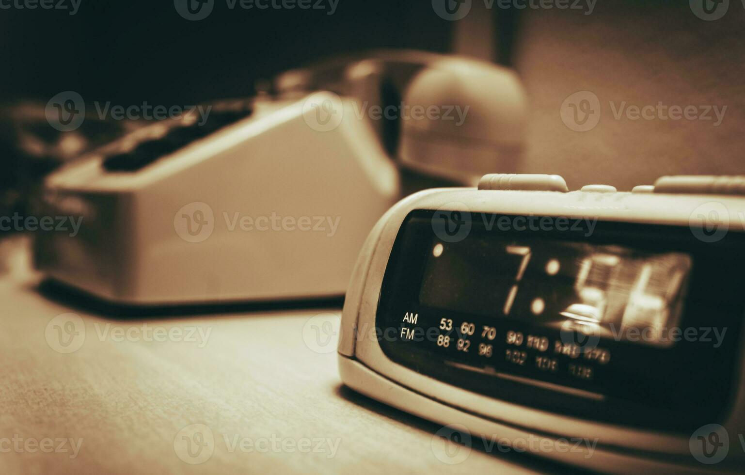 Vintage Hotel Room alarm Clock and the Analog Phone photo