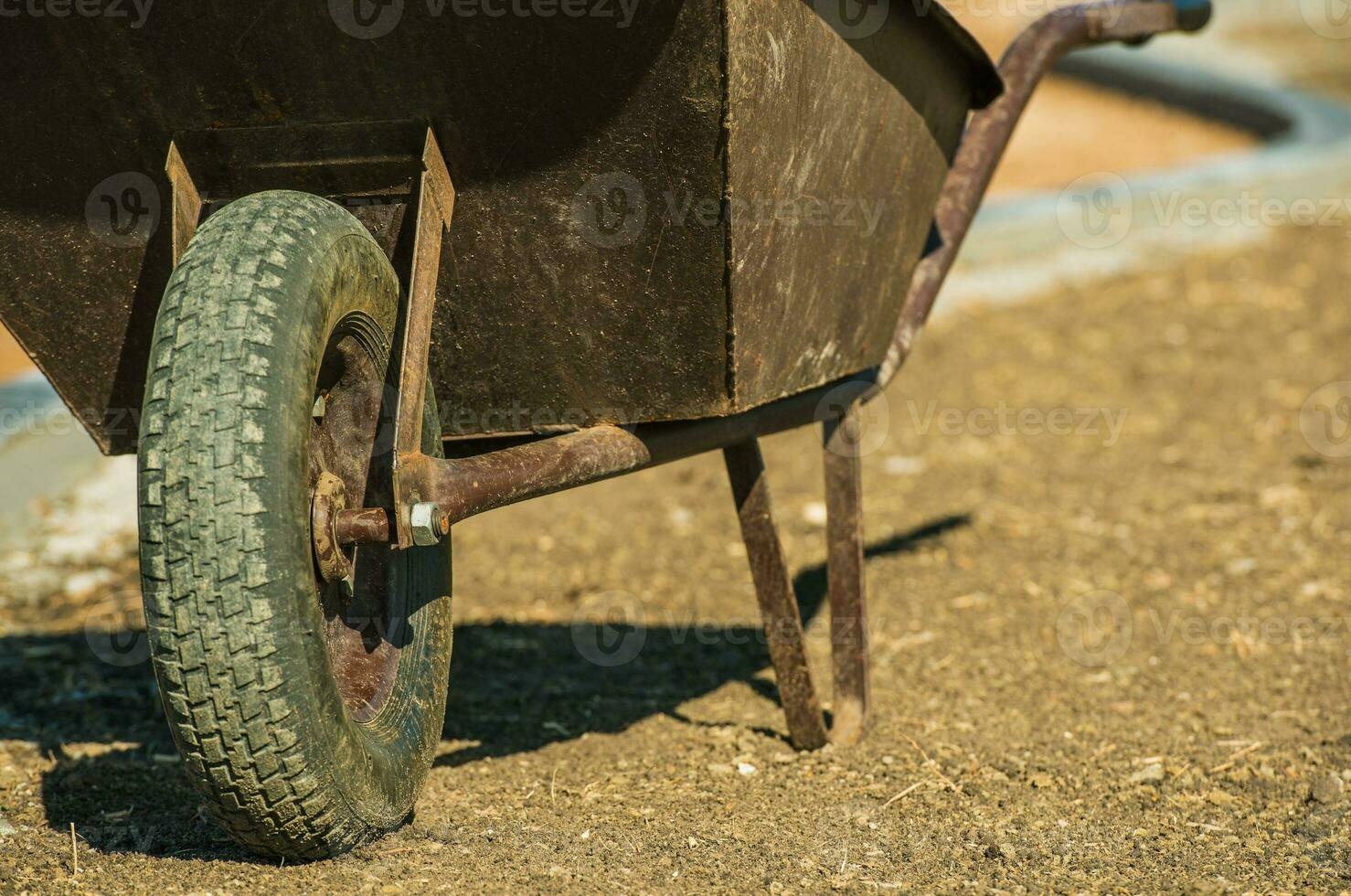 Aged Metal Wheelbarrow photo