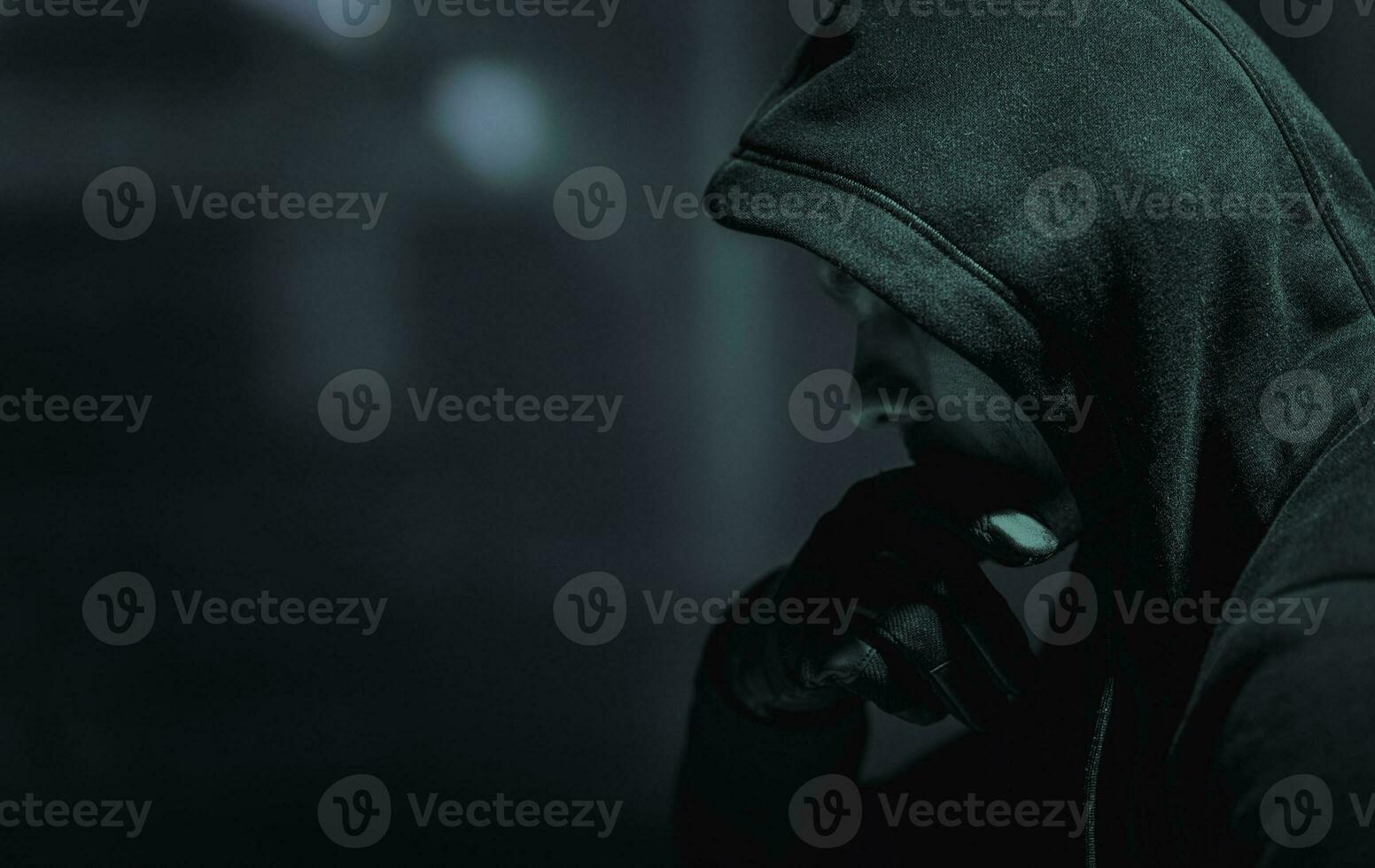 Suspicious Men in Black Hoodie photo