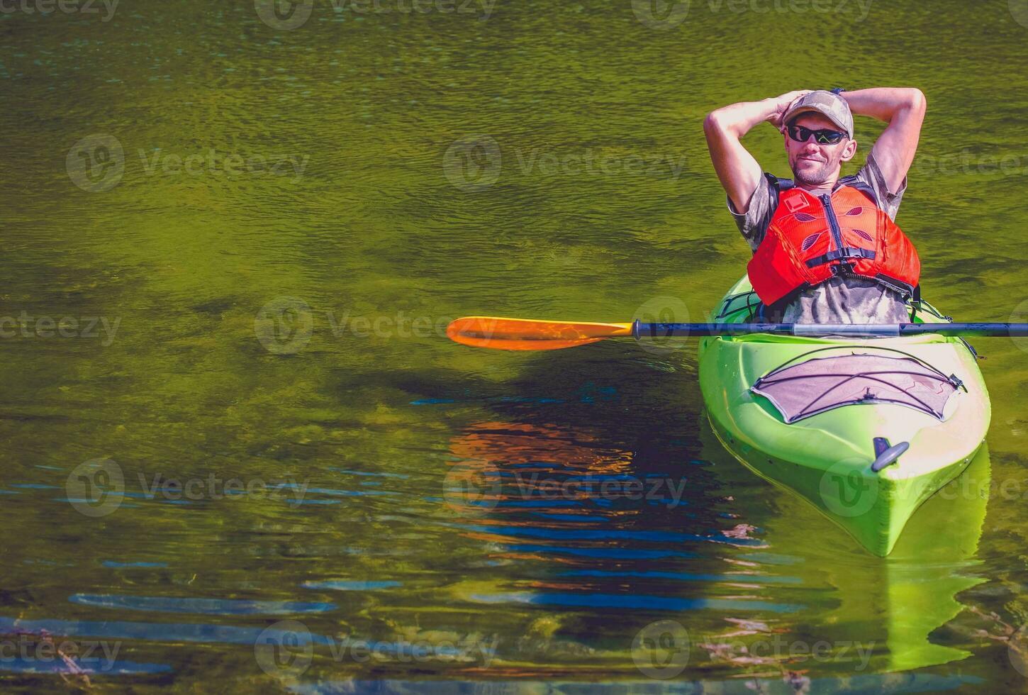 Relaxed Kayaker on the Lake photo