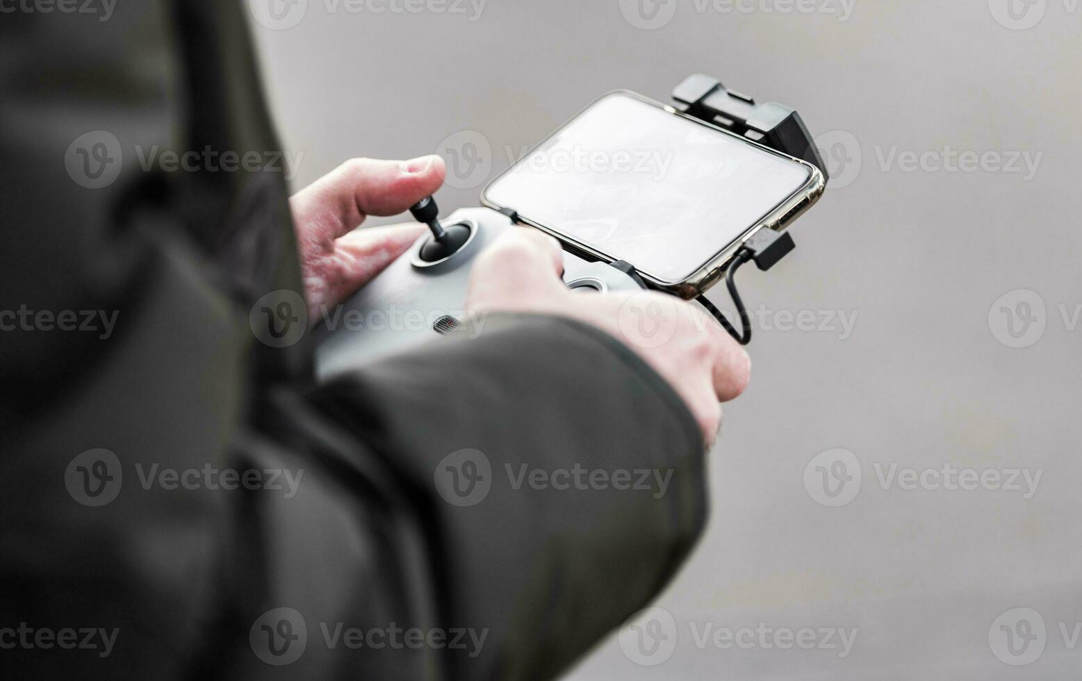 Drone Operator with Smartphone App Controller photo