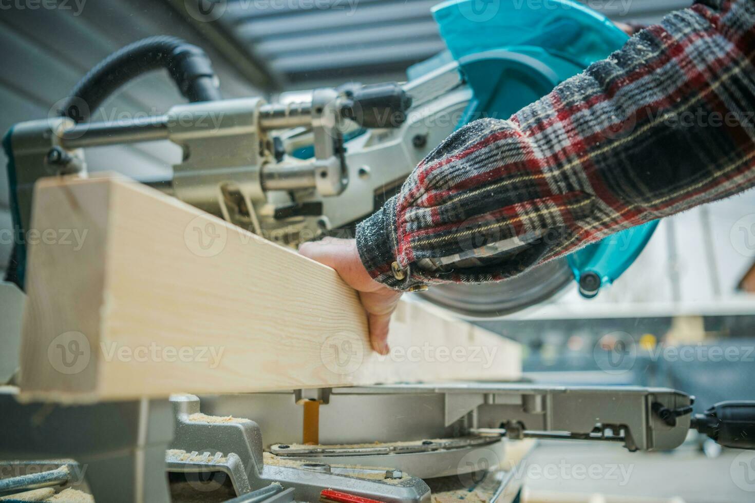 Construction Woodworker Cut a Beam to Size 24637126 Stock Photo at Vecteezy