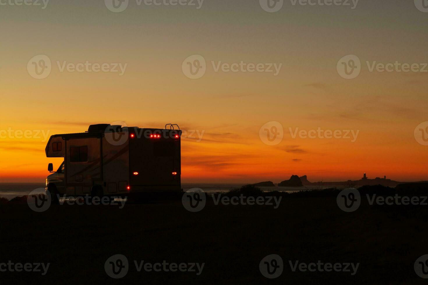 Scenic Ocean Shore Sunset and Camper Van Class C RV photo
