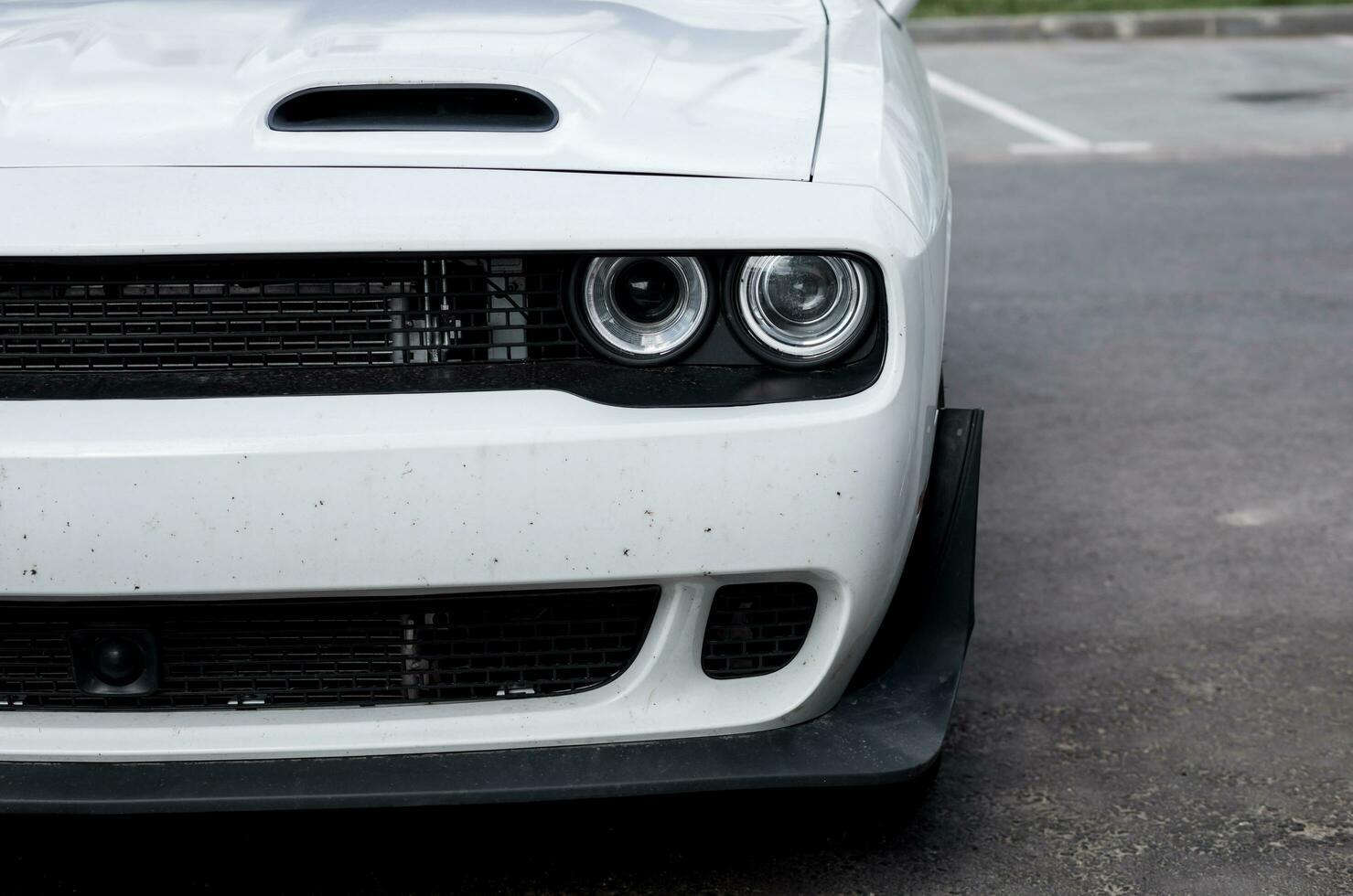 Minsk, Belarus, May 2023 - white powerful car Dodge Challenger photo