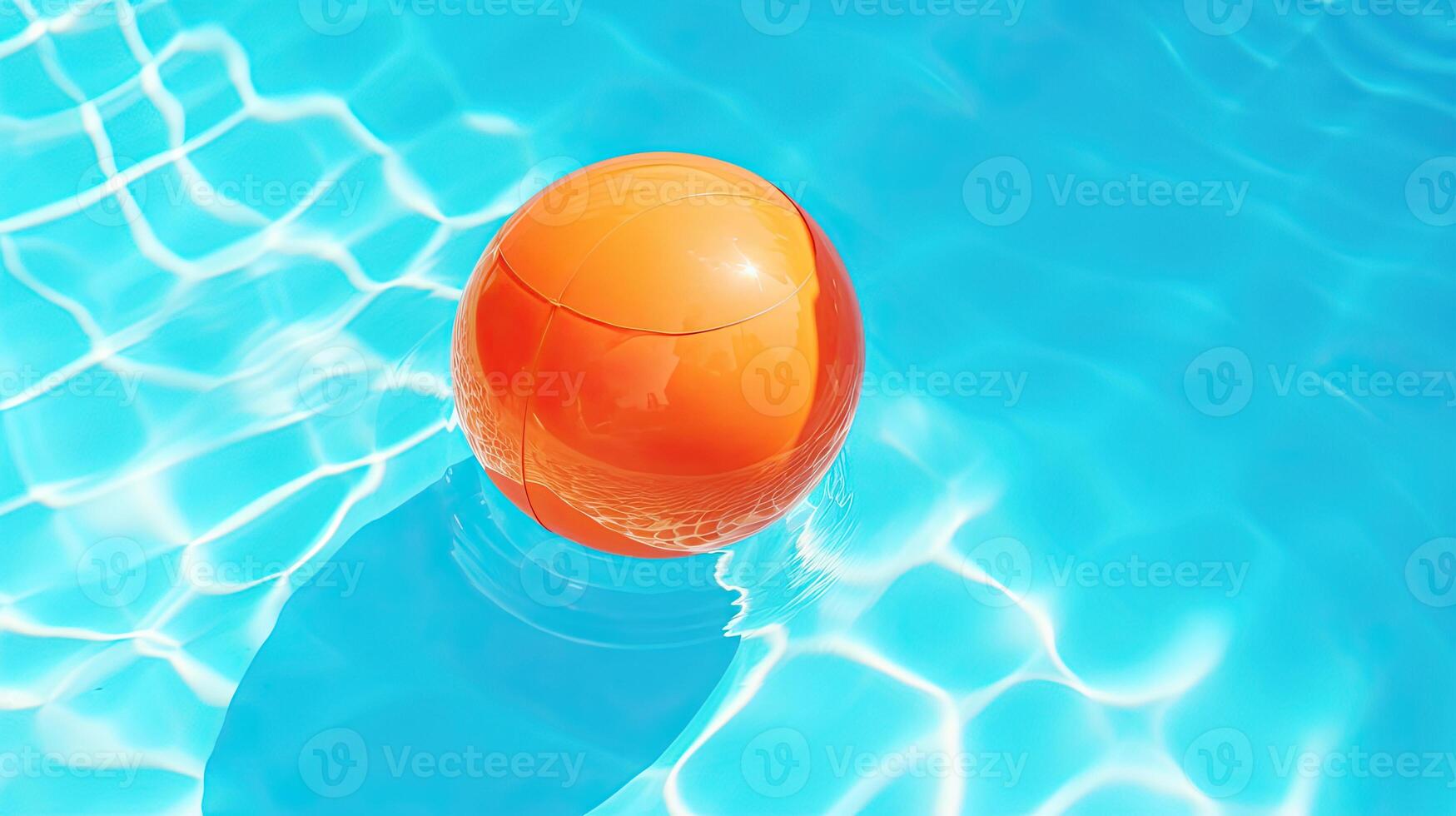 Colorful inflatable ball floating in swimming pool. photo