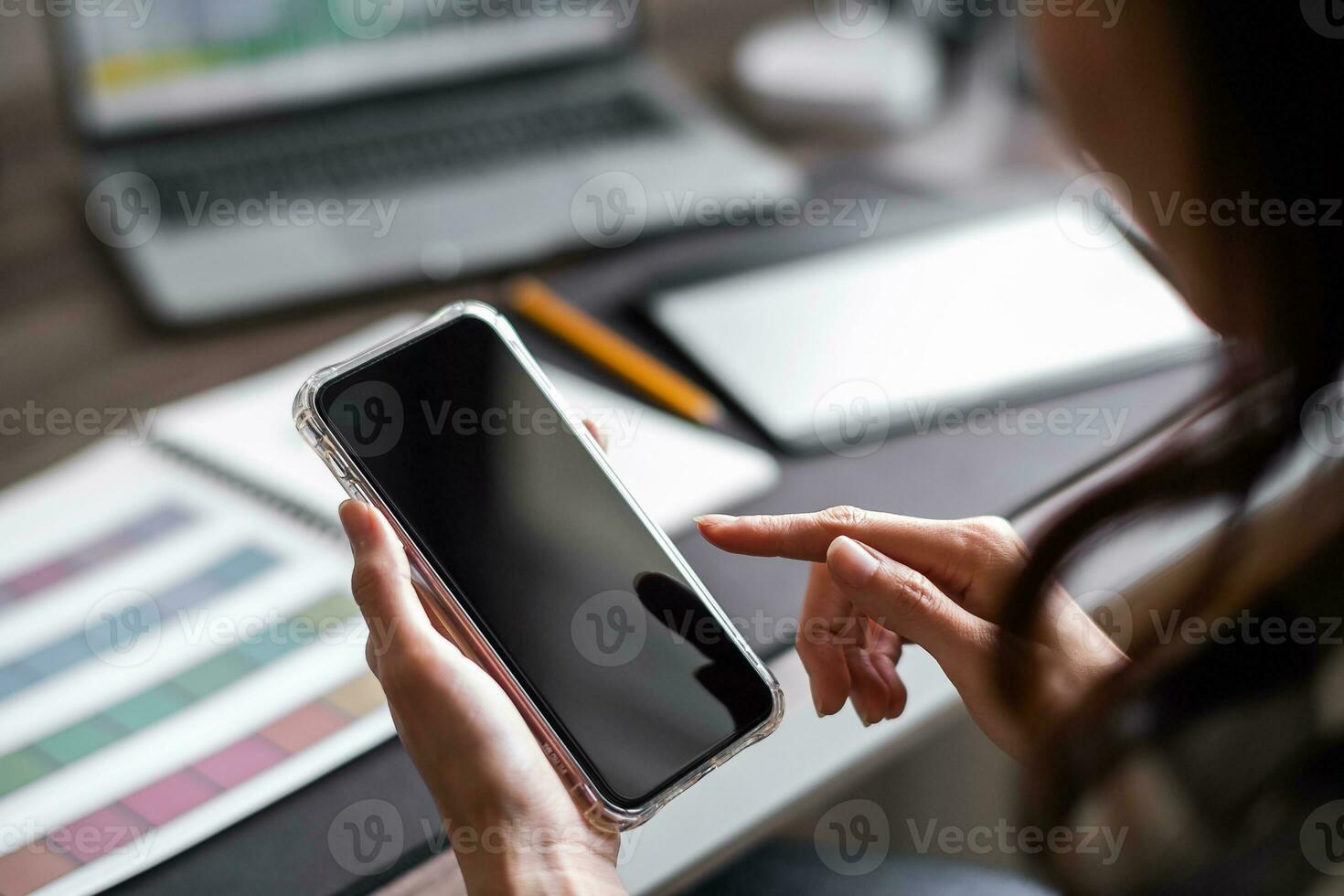 Close up of asian woman hand using a smart phone for mock up display montage. photo