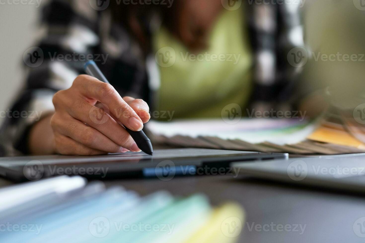 Graphic designer working with sketching logo design at office. photo