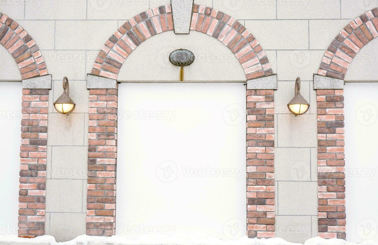 Design of sweet cafe building wall look like ancient window bricks frame of Europe with space and on white wall background. photo