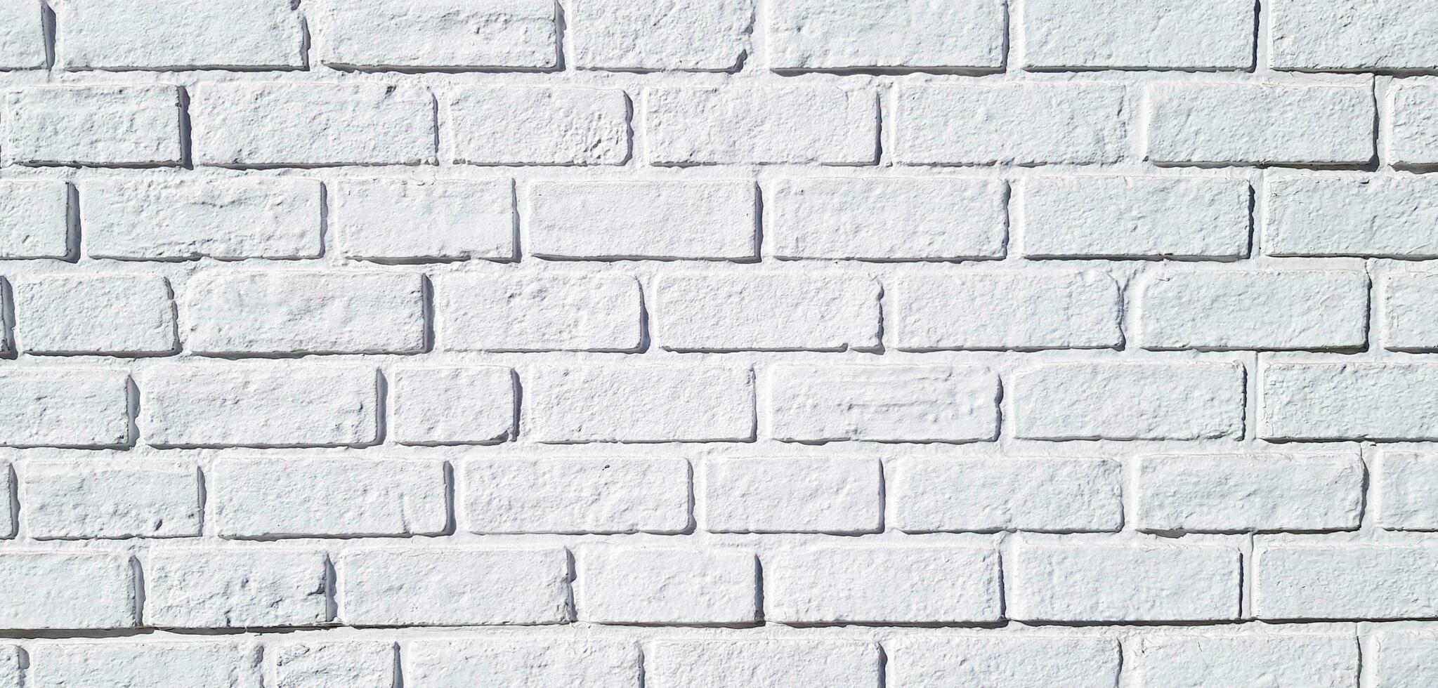 modelo blanco ladrillo pared pintado para antecedentes en Clásico tono. Arte fondo de pantalla y arquitectura exterior diseño concepto foto