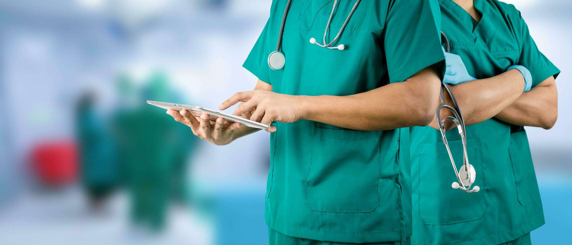 medical concept operating room doctor holding a tablet photo