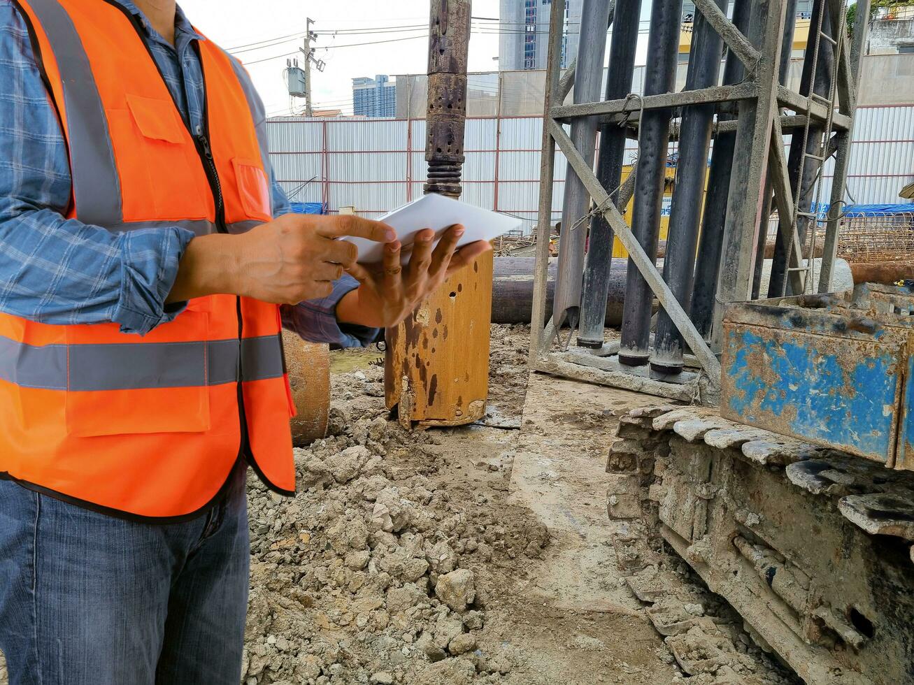 construction control engineer Cranes on the construction site area industry machine of drilling piles photo