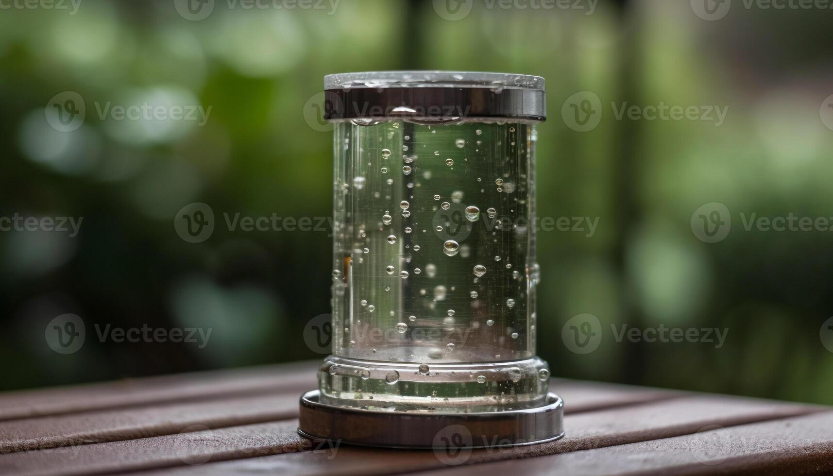 Refreshing drop of water in green glass generated by AI photo