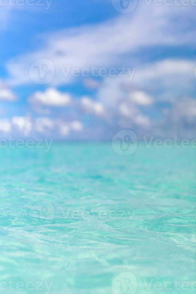 Abstract blur light on sea and ocean background for summer season. Peaceful nature environment. Blurred blue background and blue sky and bokeh sea photo