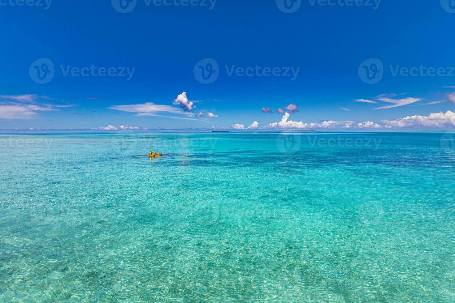 Fantastic seascape, endless tropical turquoise blue sea. Horizon from an aerial view. Beautiful landscape of clear turquoise Indian ocean, Maldives islands photo