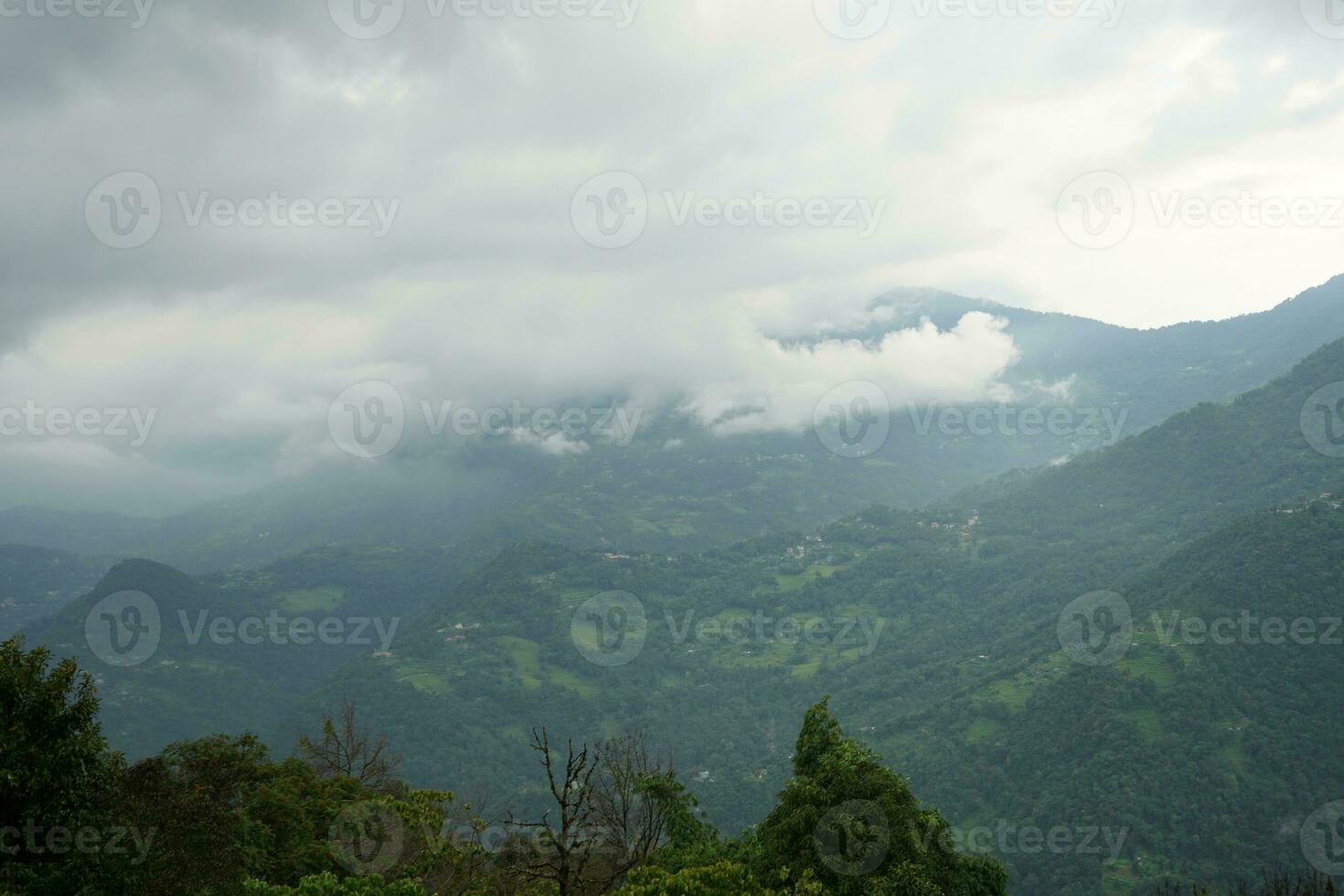 Cloudy Mountain Range View at East Sikkim photo