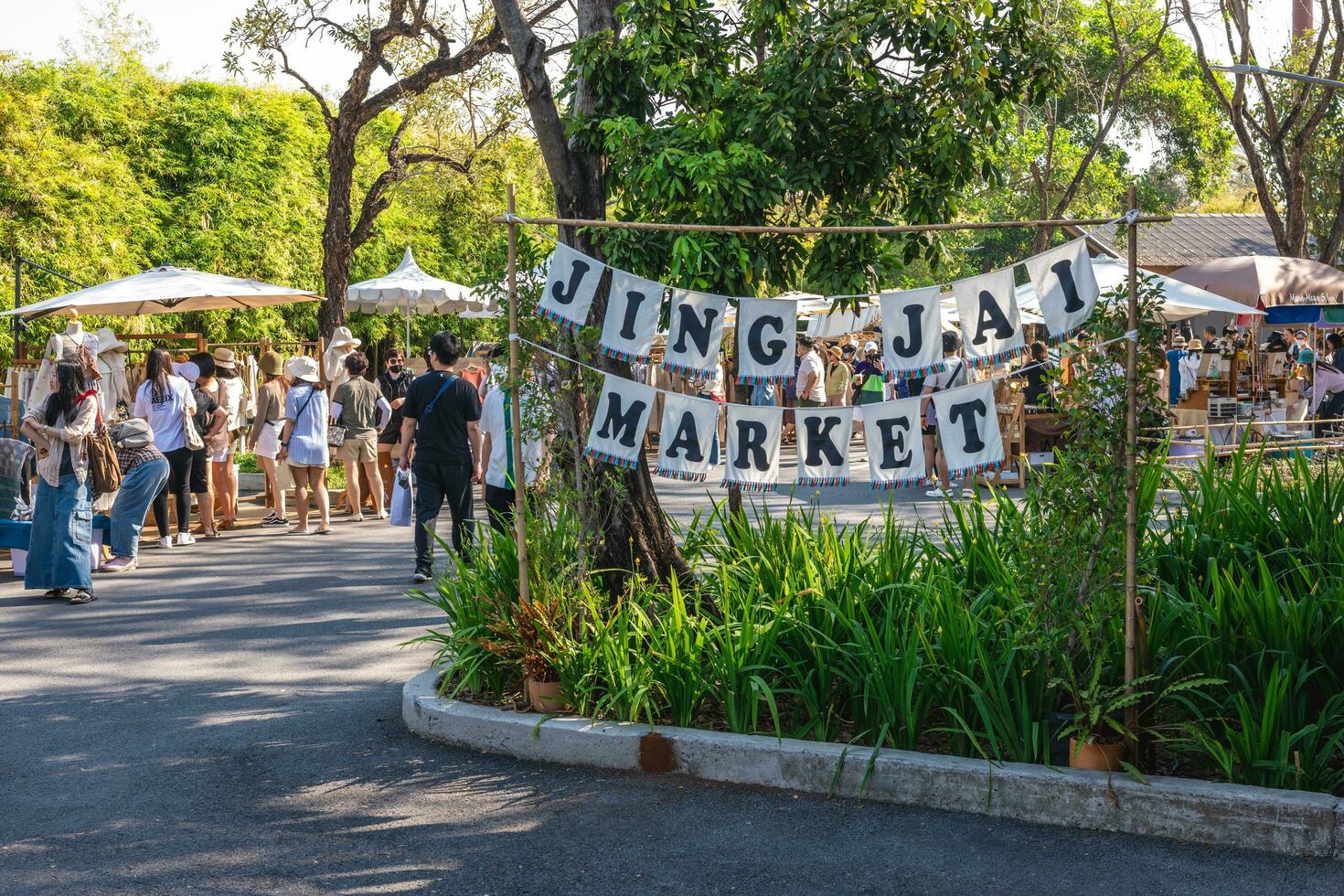 Jing Jai market, a lively weekend market supplying organic fruit and vegetable, coffee and food, located in chiang mai, thailand. It takes place in the morning every weekend. photo