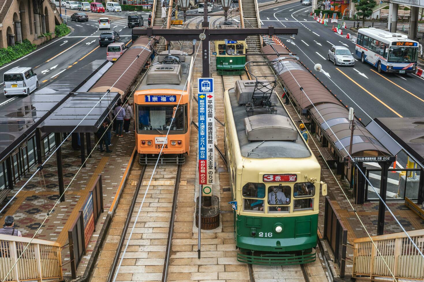 tramcar of Nagasaki City Electric Tramway, a private tram system in Nagasaki, Kyushu, Japan. It was opened on November 16, 1915 and provides a convenient way to travel around the city photo