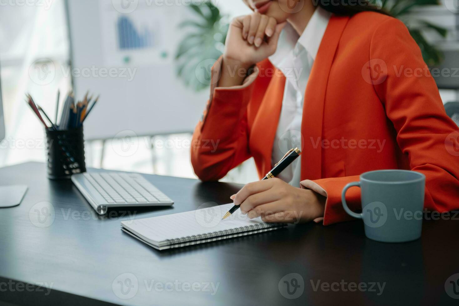 Businesswoman hand using laptop, tablet and smartphone in office. Digital marketing media mobile app and discussing plan new start up project. Finance task. photo