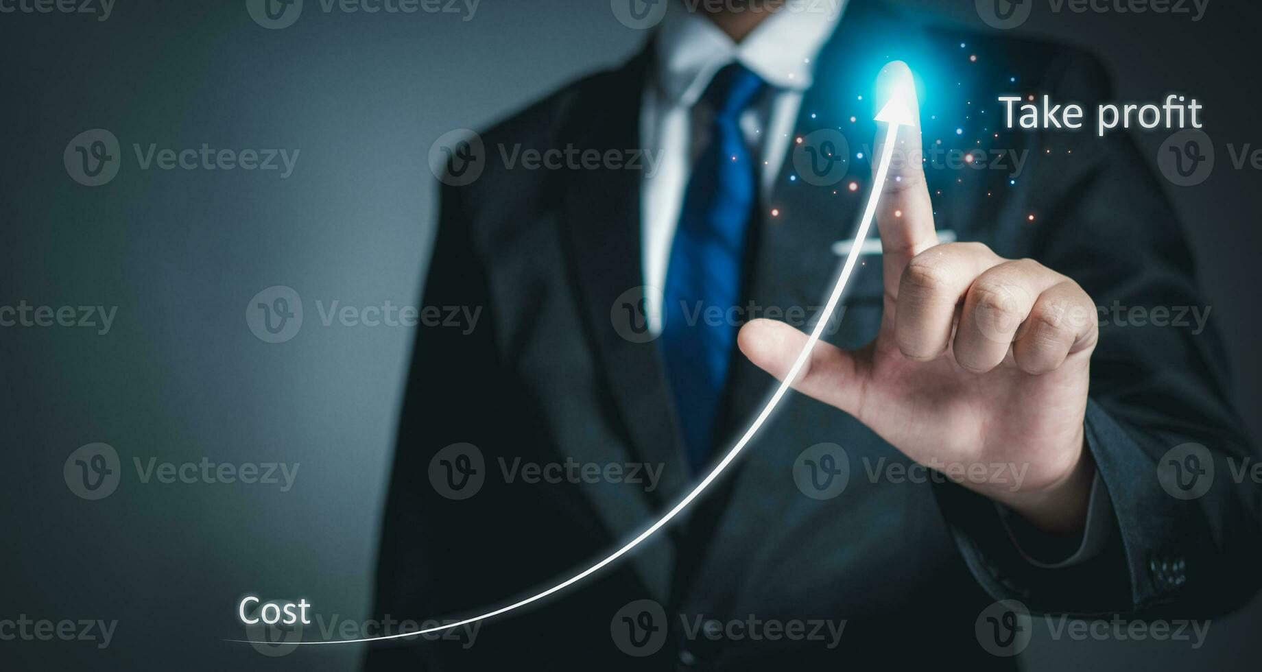 Stock trading. Finance. Investing. Growing business. Businessman in suit showing finger pointing to arrow tip on gray background. photo