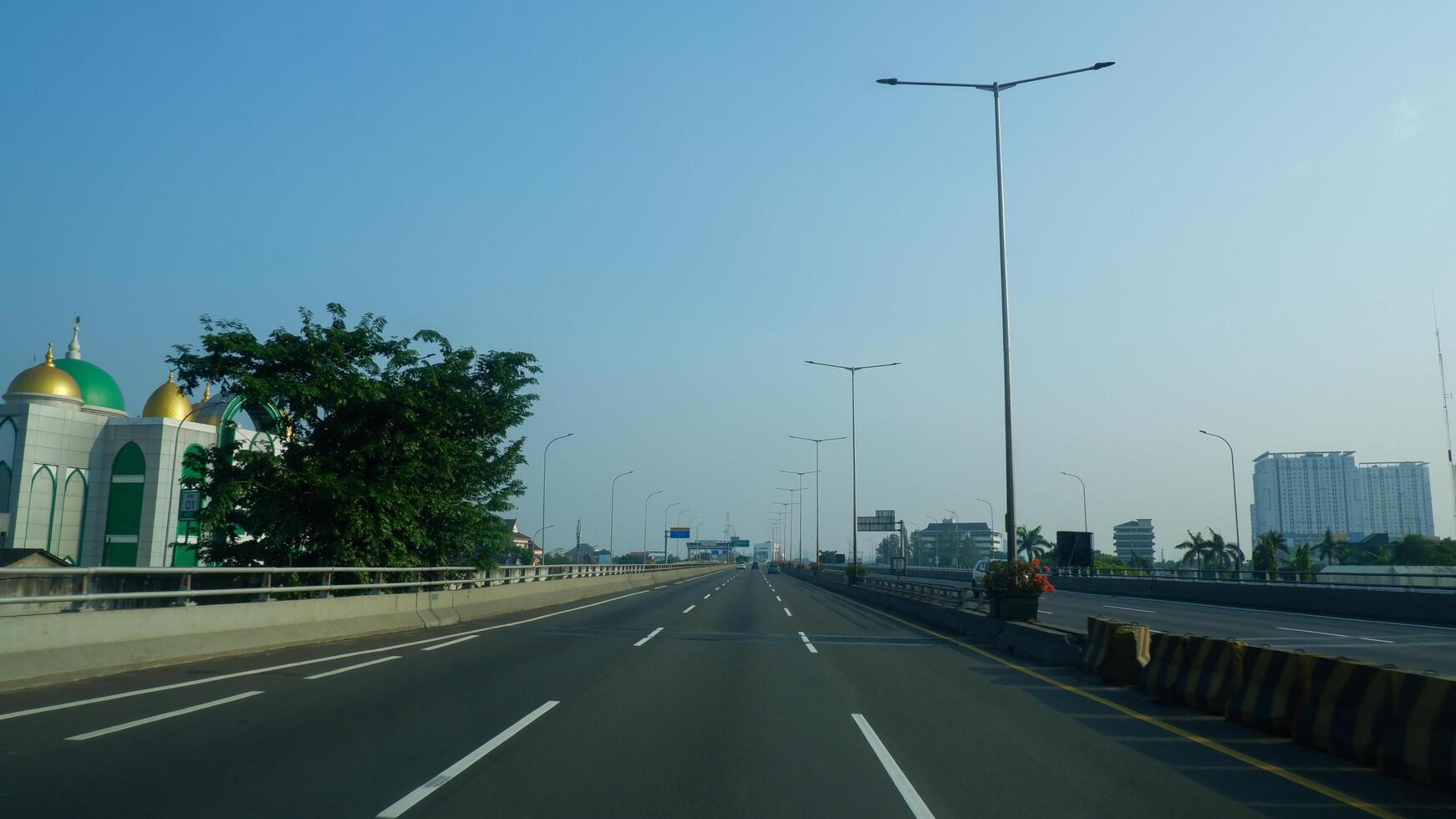 An empty Jakarta inner ring toll road is unusual because the city is normally congested. photo