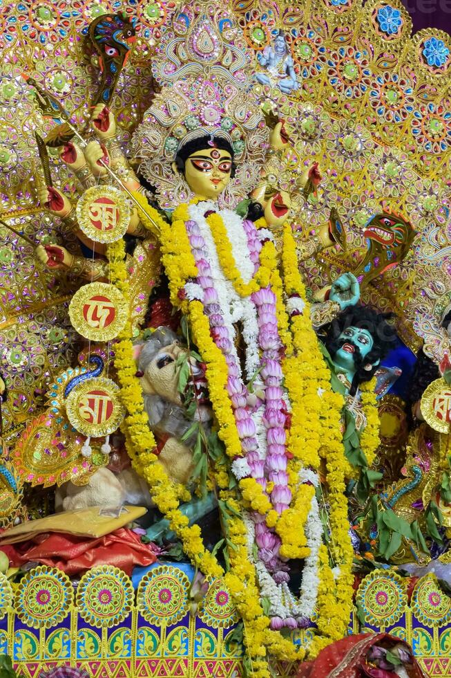 Goddess Durga with traditional look in close up view at a South Kolkata Durga Puja, Durga Puja Idol, A biggest Hindu Navratri festival in India photo