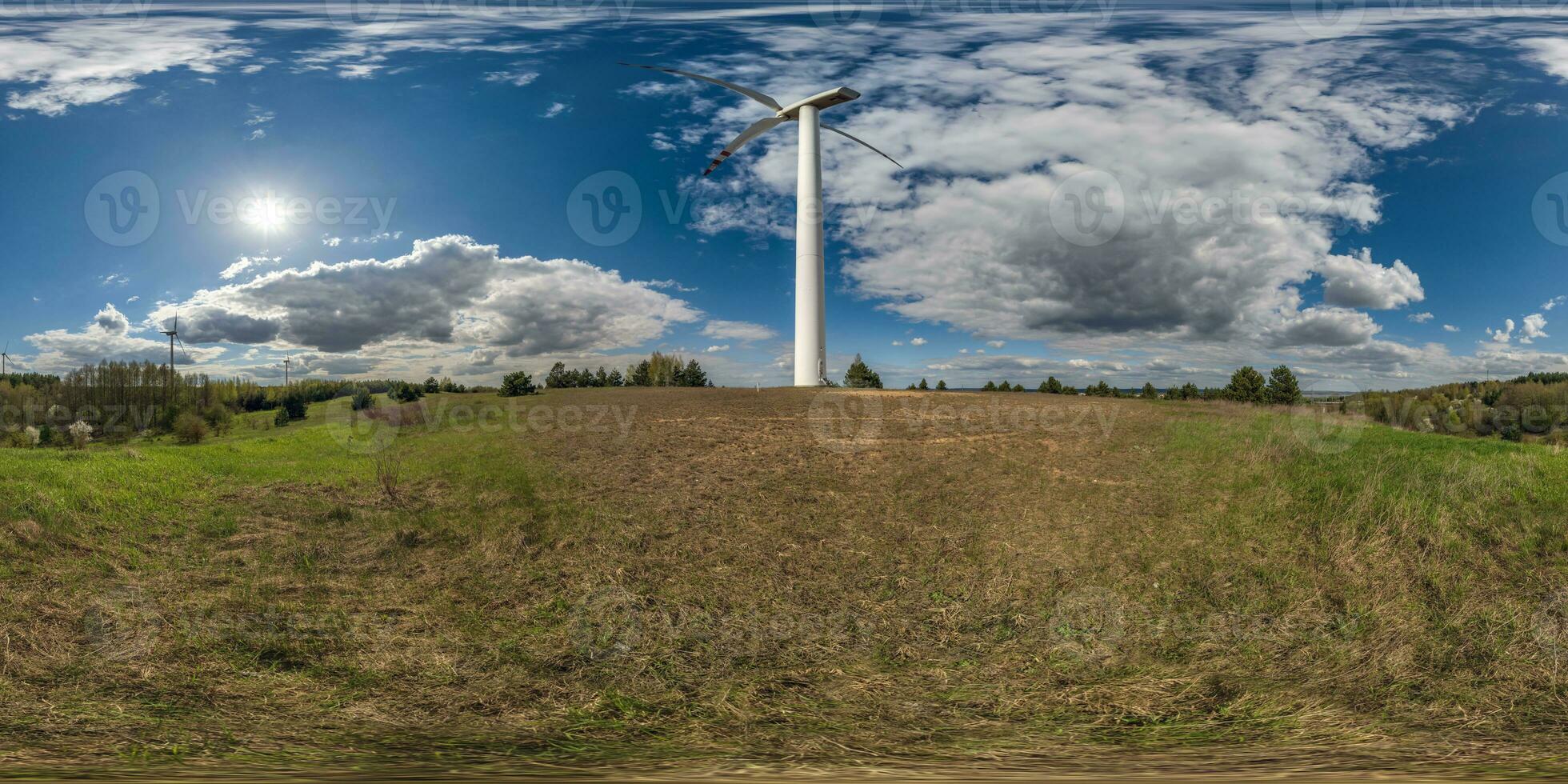 full seamless spherical 360 hdri panorama view near huge windmill propeller in equirectangular projection, VR AR virtual reality content. Wind power generation. Pure green energy. photo