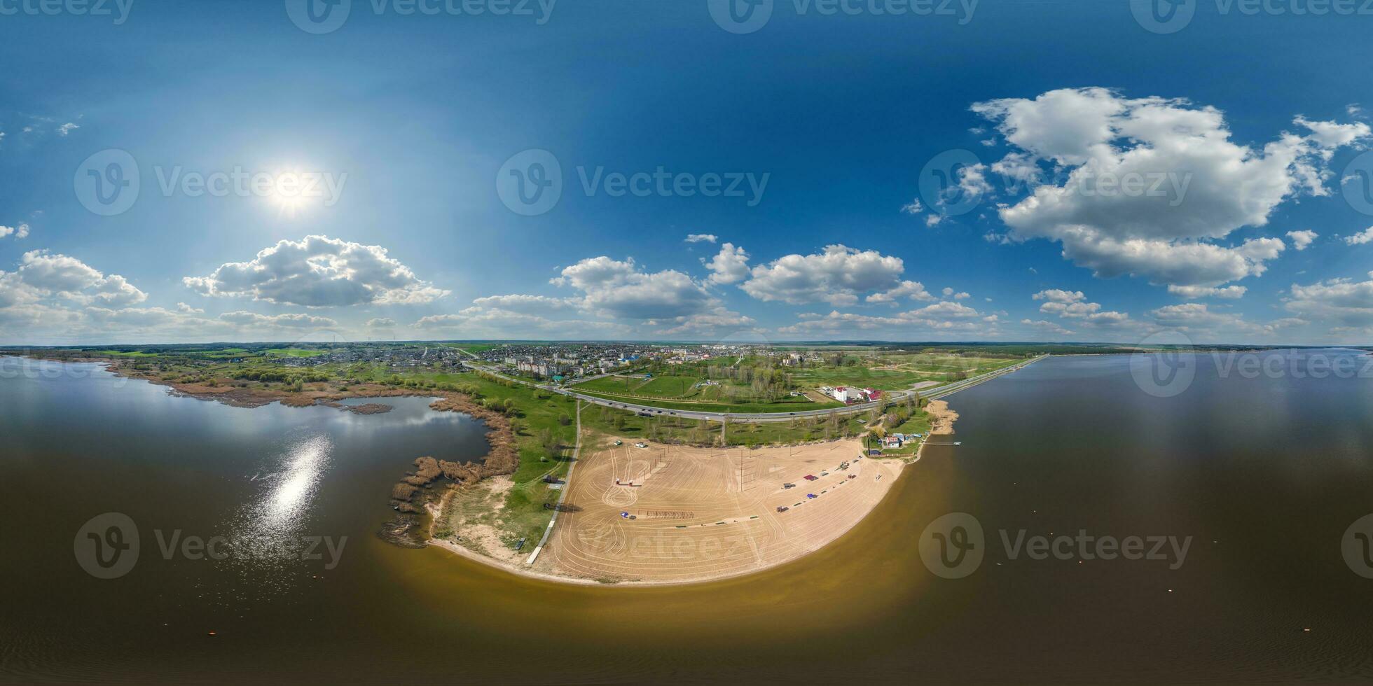 full hdri 360 panorama and aerial view a huge reservoir lake near provincial town on coast  in equirectangular projection may use like sky replacement for panoramic drone shot photo